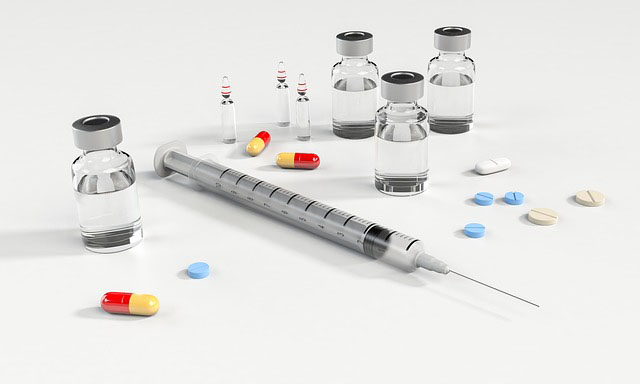 Opioid pills and Fentanyl drug needles